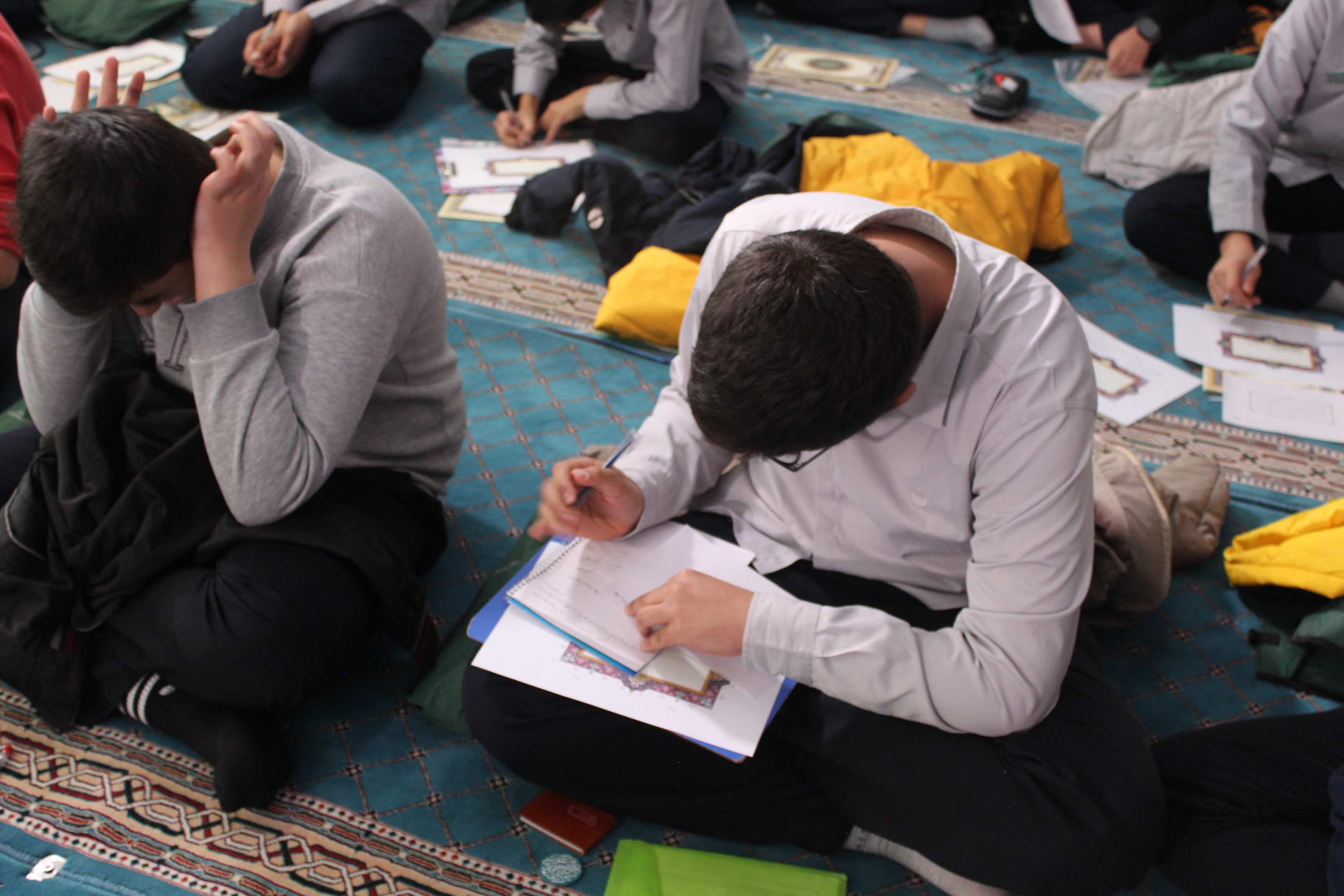 بزرگترین رویداد کتابت قرآن توسط دانش‌آموزان ساوجبلاغ